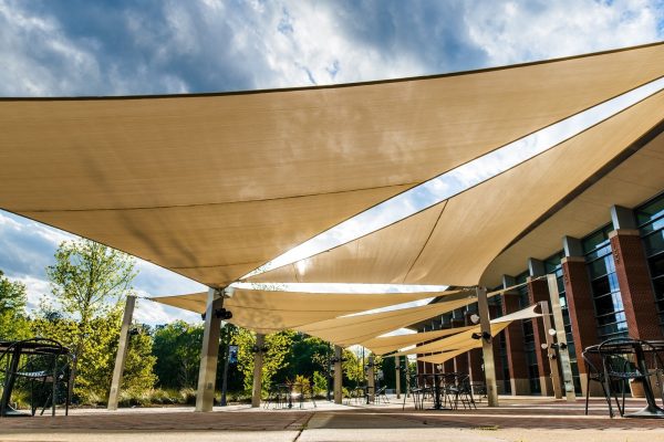 Enhancing Poolside Comfort with Stylish Shade Sails